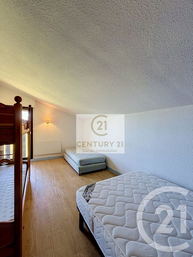 Appartement Duplex à vendre - 2 pièces - 41.19 m2 - LES ROUSSES - 39 - FRANCHE-COMTE - Century 21 Sanac Immobilier
