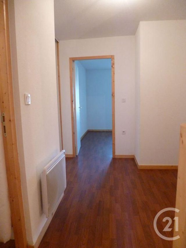 Appartement Duplex à louer - 2 pièces - 41.42 m2 - LES ROUSSES - 39 - FRANCHE-COMTE - Century 21 Sanac Immobilier
