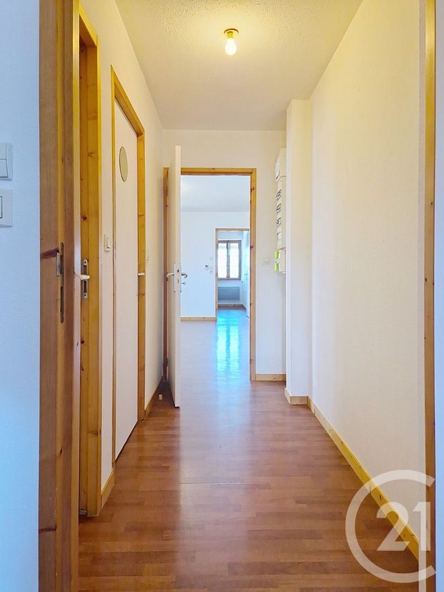 Appartement T4 à louer - 4 pièces - 65.33 m2 - LES ROUSSES - 39 - FRANCHE-COMTE - Century 21 Sanac Immobilier
