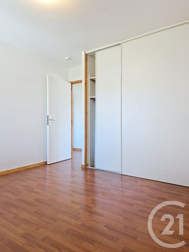 Appartement T4 à louer - 4 pièces - 65.33 m2 - LES ROUSSES - 39 - FRANCHE-COMTE - Century 21 Sanac Immobilier