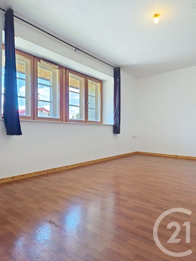 Appartement T4 à louer - 4 pièces - 65.33 m2 - LES ROUSSES - 39 - FRANCHE-COMTE - Century 21 Sanac Immobilier
